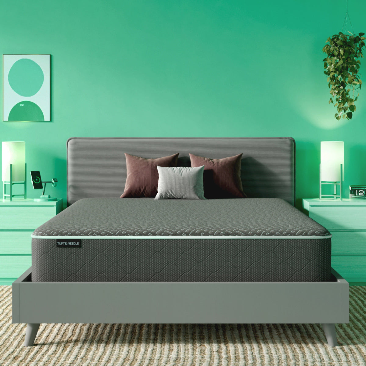 The Tuft and Needle Mint Mattress II in a green bedroom