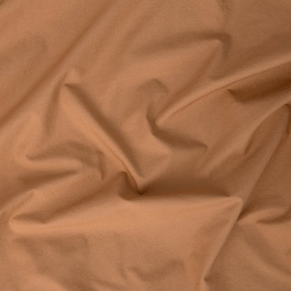 Close-up view of the fabric on the the Tuft and Needle Percale Duvet Cover Set||color:canyon