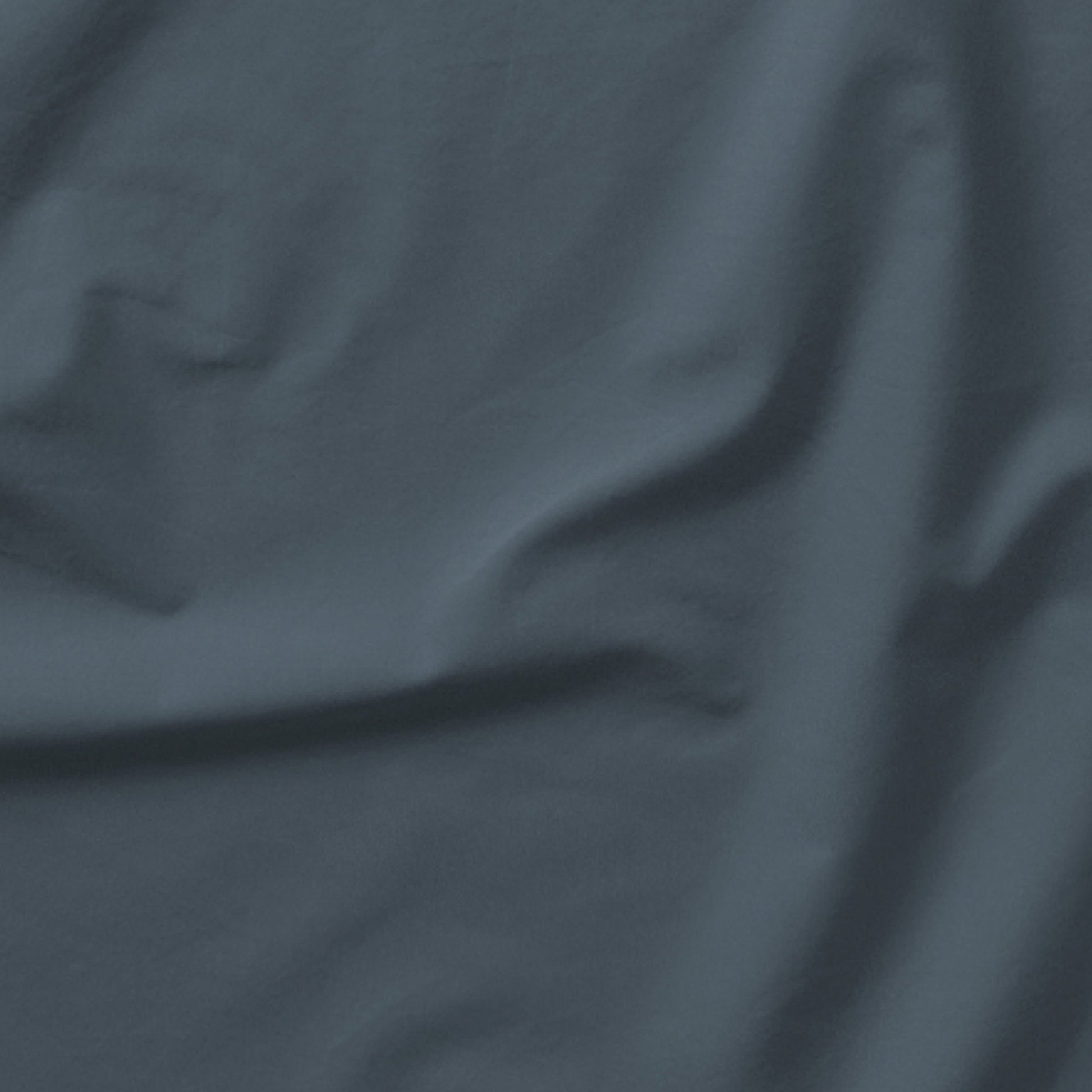 The Tuft and Needle Classic Percale Sheet Set, one sheet spread out || color: Slate
