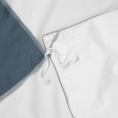 Close-up view of the corner ties on the Tuft and Needle Percale Duvet Cover Set||color:slate
